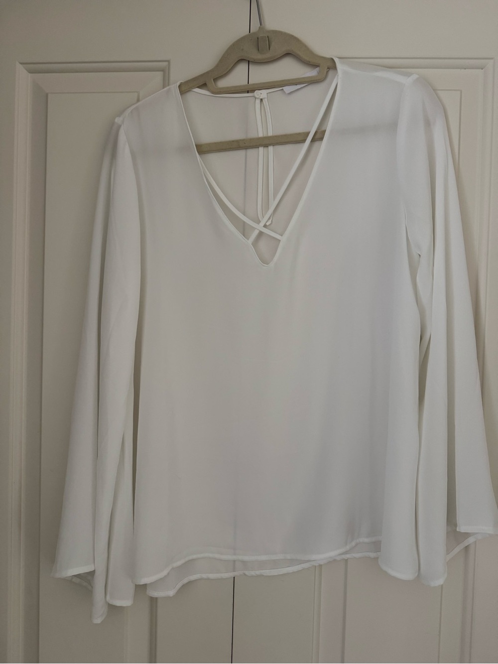 Lush soft off White V-Neck Blouse with Crisscross detail and Long bell Sleeves